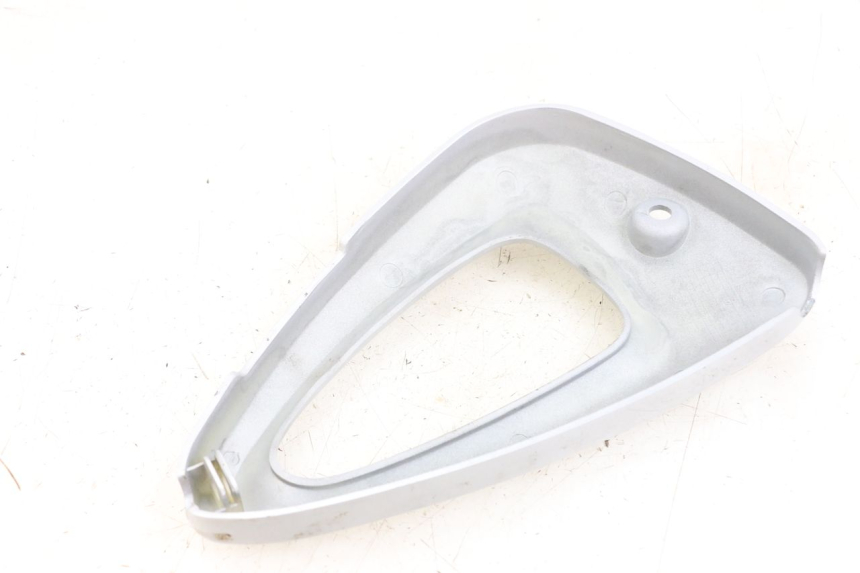 photo de RIGHT SIDE UNDER SEAT PANEL HYOSUNG XRX 125 (2000 - 2008)