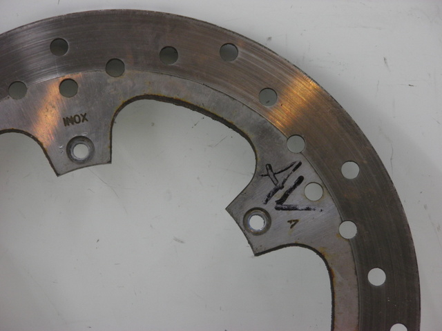 photo de FRONT BRAKE DISC PIAGGIO XEVO - X EVO 125 (2010 - 2015) - Zoom on usage condition