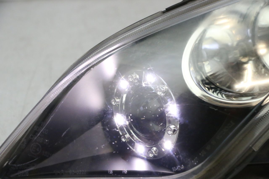 photo de LEFT FRONT HEADLIGHT KYMCO DINK STREET 125 (2009 - 2014)