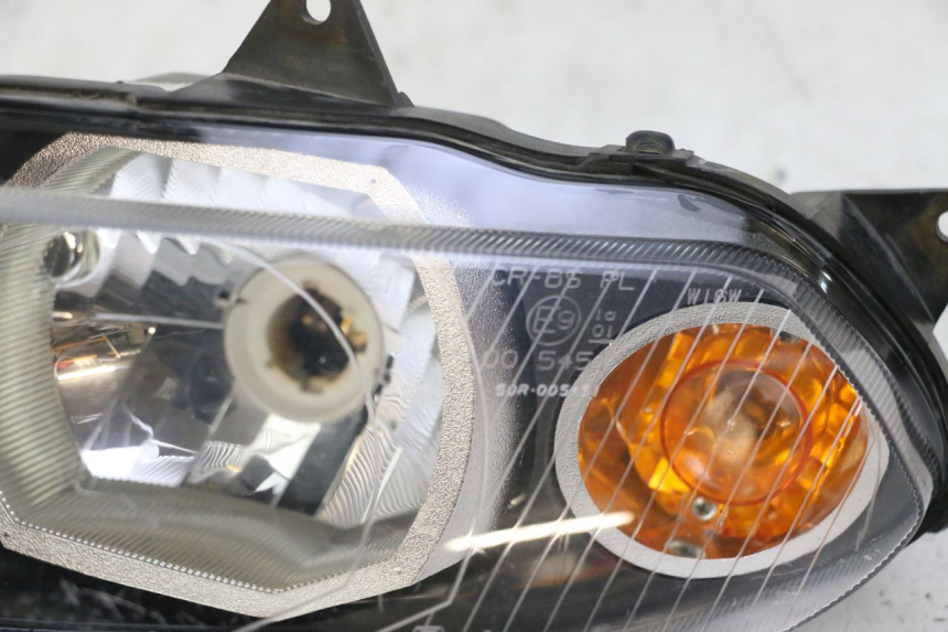 photo de LEFT HEADLIGHT YAMAHA TZR 50 (2008 - 2016) - Surface and material condition