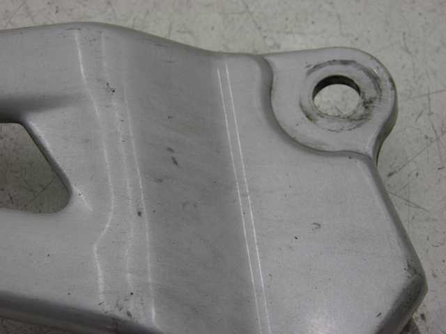 photo de REAR RIGHT FOOTREST MOUNT YAMAHA YBR 125 (2007 - 2009)